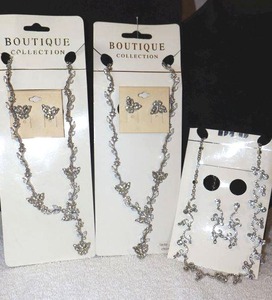 lot 224 image: Jewelry Swirl and butterfly style necklace and earring sets