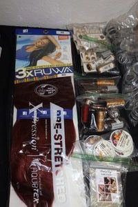 lot 237 image: Red wig and hair weaving threads