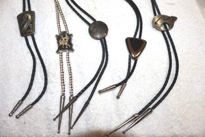 lot 203 image: Jewelry black bolo ties