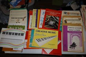 lot 87 image: Music teacher piano books as shown plus blank music paper