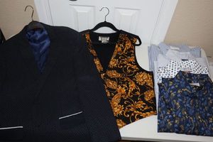lot 59 image: Mens dress shirts and Linea Uomo suit jacket with polka dots. Plus gold and black vest.