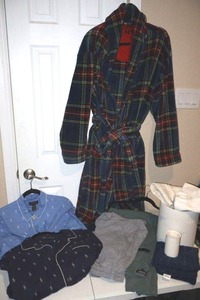 lot 55 image: Mens sleepwear robe pajama sets and pants. Plus a few bathroom items.