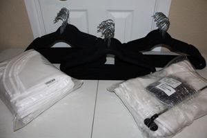 lot 54 image: Felt hangers, tie rack, and  suit shoulder covers