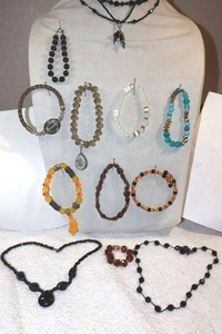 lot 249 image: Glass bead jewelry black beaded necklaces, and multiple bracelets as shown