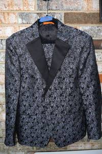 lot 69 image: TALLIA gray and black 2-piece suit.