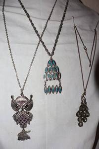 lot 28 image: Movement Jewelry Owl, peacock, and blue beaded necklaces