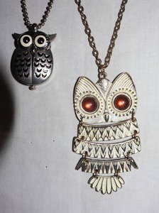 lot 32 image: Movement Jewelry owl pendant and owl clock necklaces