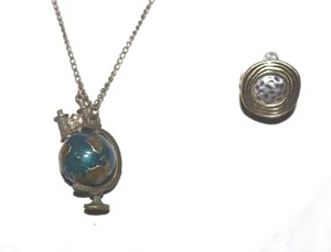 lot 34 image: Movement Jewelry globe pendant necklace and 2 sided ring