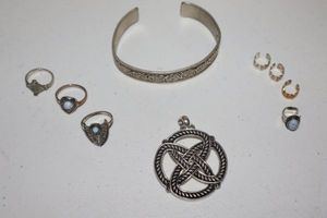 lot 47 image: Movement Jewelry Celtic rings, ear hoops, bracelet and pendant