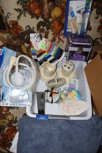 lot 270 image: Bathroom items toothbrush holder, shower head, nightlight, hair ties and more
