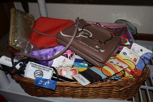 lot 271 image: Small purses and bags, hair ties, curling iron