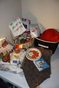 lot 276 image: Christmas lot table runner, table linens, and decorations