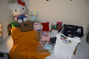 lot 273 image: Kids clothes and Hello Kitty toy