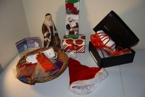 lot 289 image: Christmas decorations, silk gloves, and red womens shoes size 10 (look new)