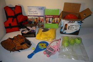 lot 280 image: Sports and games lot bowling ball, baseball glove, kids life vest and more