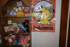 lot 319 image: Pokmon poster and toys, see photos