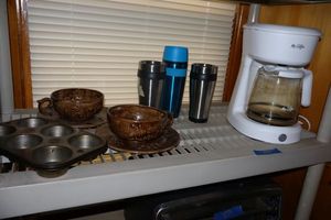lot 338 image: Mr. Coffee coffee pot, Soup bowls, muffin tins, and insulated mugs