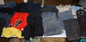 lot 361 image: Adult clothes, hoodies, and jeans