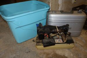lot 406 image: Vintage sewing machine, sewing items, and metal case