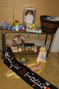 lot 428 image: Kids toys, holiday decorations, and porcelain doll