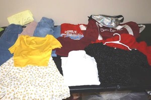 lot 378 image: Teen or small woman clothes size S.  Plus cheer bag