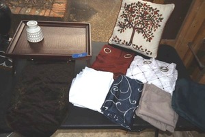 lot 387 image: Pillows and blankets in blue, brown, and white colors