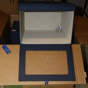 lot 76 image: Cambridge drop front shirt boxes in blue linen color - set of 4 total. Each box measures 15L x 11W x 8 H.