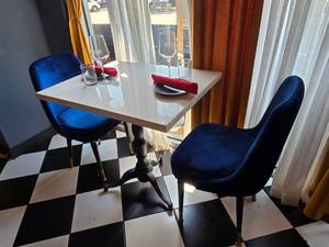 lot 9 image: COMPLETE TABLE SET FOR 2  Includes Solid Marble Table w Cast Iron Spindle Base, 2 Velvet Blue Chairs &amp 2 Complete Place Settings.&nbsp Table Measures 30 x 24