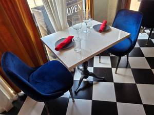 lot 10 image: COMPLETE TABLE SET FOR 2  Includes Solid Marble Table w Cast Iron Spindle Base, 2 Velvet Blue Chairs &amp 2 Complete Place Settings.&nbsp Table Measures 30 x 24