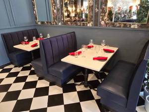 lot 21 image: Complete Double Booth Set w 2 Single Booths, 1 Double Booth, 2 Solid Marble Tables w Double Cast Iron Spindle Bases & Place Settings For 8 People.  Tables Measure 48 x 30