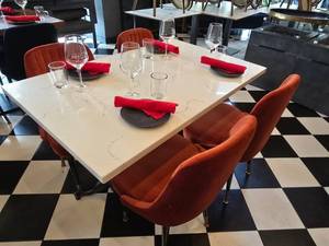 lot 22 image: COMPLETE TABLE SET FOR 4  Includes Solid Marble Table Top w Double Cast Iron Spindle Base, 4 Velvet Orange Chairs &amp 4 Complete Place Settings.&nbsp Table Measures 48 x 30