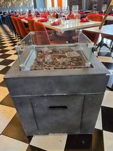 lot 76 image: Noble House Wellington Outdoor Propane Fire Pit w Glass Wind Shield