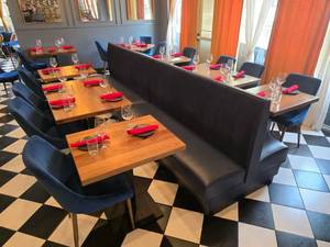 lot 91 image: Large Lot of Restaurant Seating.  Includes 2 Double Backed Blue Velvet Backet Booth Sections, 4 Solid Wood Top Tables For 2, 2 Solid Wood Top Tables for 4, 8 Blue Velvet Chairs & Place Settings 16 People