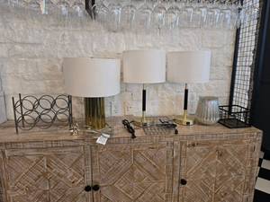 lot 104 image: Lot of Misc Dcor.  Includes 3 Lamps (2 Are Touch Lamps), Wine Rack, Gold Decorative Elephant, Glass Candle Holder & 2 Wire Baskets