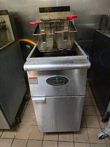 lot 25 image: MainStreet Equipment Natural Gas Stainless Steel Floor Fryer, Model 541FF50N.  FRYER ROLLS AND HAS BEEN DISCONNECTED FROM GAS.&nbsp READY TO ROLL OUT THE DOOR