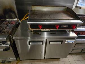 lot 27 image: WOW  COMBO LOT  Gusto Equipment Gas Griddle w Avantco 48 Undercounter Rolling Refrigerator (Model 178AU48RHC).&nbsp GRIDDLE HAS BEEN DISCONNECTED FROM GAS AND BASE UNIT ROLLS.&nbsp READY TO ROLL OUT THE DOOR