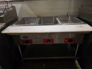 lot 32 image: CookRite Open Well Electric Steam Table (Model CSTEA-3).&nbsp UNIT ROLLS FOR EASY REMOVAL.