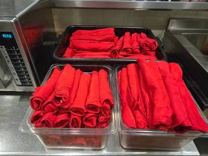 lot 124 image: Large Lot of Restaurant Flatware Rolls.  Inlcudes Approx 135 Napkins, Knives & Forks