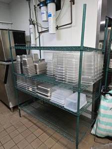 lot 148 image: Shelf w Contents.  MASSIVE Lot of DON Stainless Steel Steam Pans & Cambro Food Storage Containers.  Metro Antimicrobial Shelf INCLUDED  Shelf Measures 74 x 60 x 24