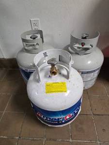 lot 157 image: Lot of 3 Propane Tanks.  Tanks feel like they have propane in them.