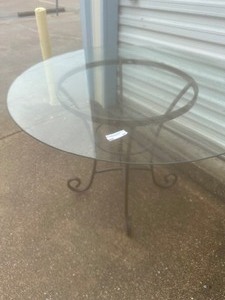 lot 89 image: 3049 glass top oval dining table with metal stand