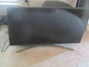 lot 142 image: TV, Brand unknown- works,  remote not found , believed to be a Samsung