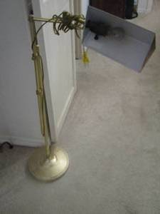 lot 81 image: gold colored floor lamp