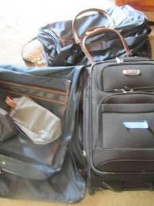 lot 101 image: large lot of traveling bagsDUFFLES