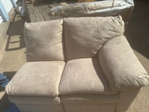 lot 32 image: Sectional includes  2 love seats and a chair, wrapped from shipping co.  55 wide plus corner piece Tan in color