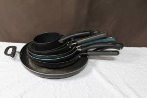 lot 16 image: lot of frying pans