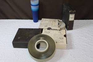 lot 22 image: 3 slide tray instructions for a projector  and cups