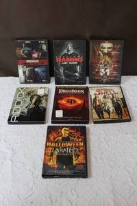 lot 40 image: Lot of DVDs like RamboRiddickthe Lord of the ringsand many more titles see pictures