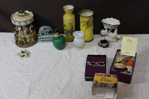 lot 68 image: Just the right shoe figure with paperworkcherub trinket trayvasessmall music Box TV and more see pictures