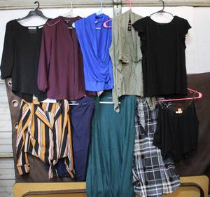 lot 93 image: Lot of blouses ranging in sizes small to XL brands like me janepremisegypsies and many more